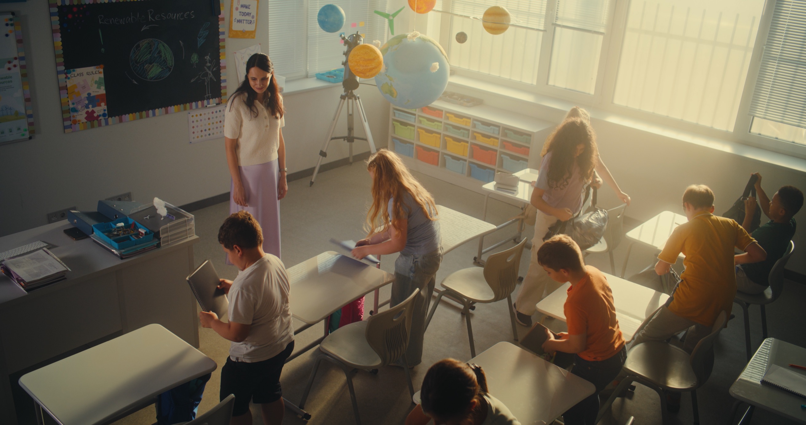 A Teach for Poland fellow with students in a Polish classroom
